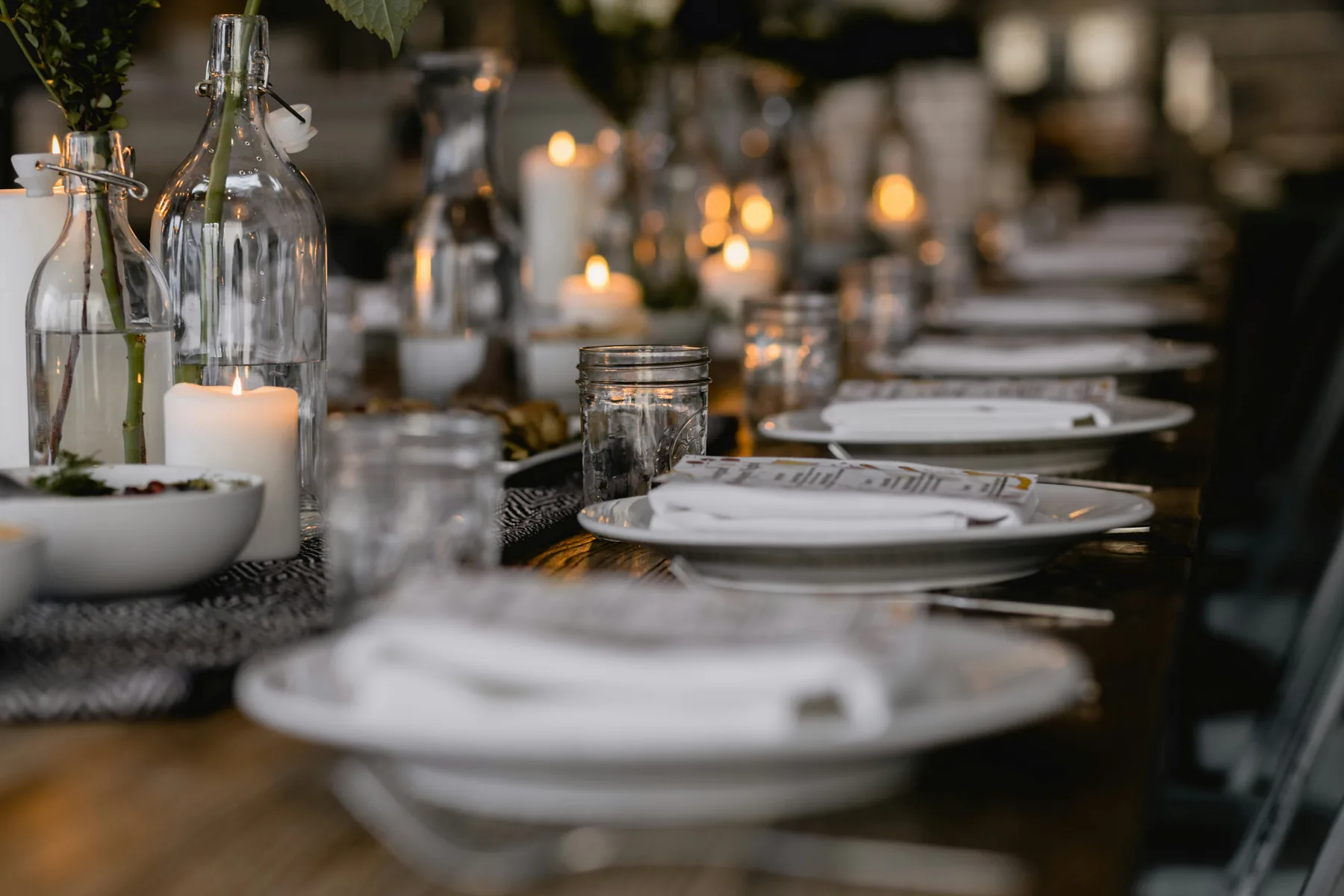 A private table laid and lit before the first course