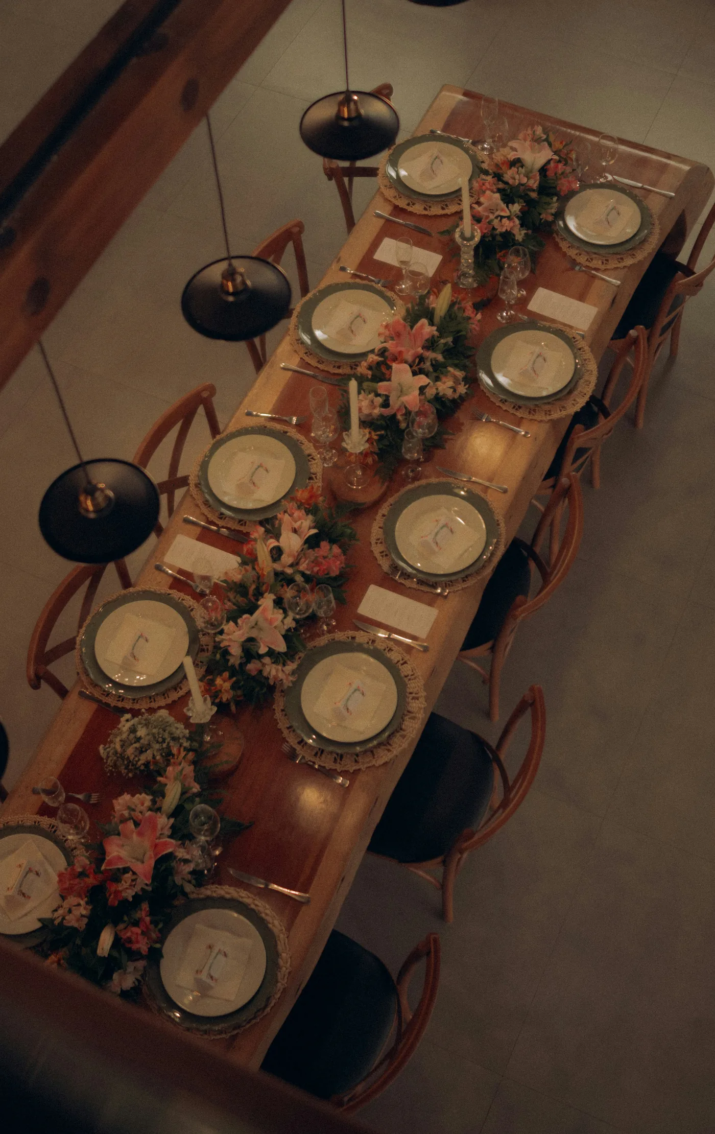 A table seen from above, set with small tasting bowls for a group